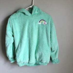 NWOT Betsey Johnson  Mint Green Fuzzy Hoodie with Sequin Rainbow, Size L (10/12)